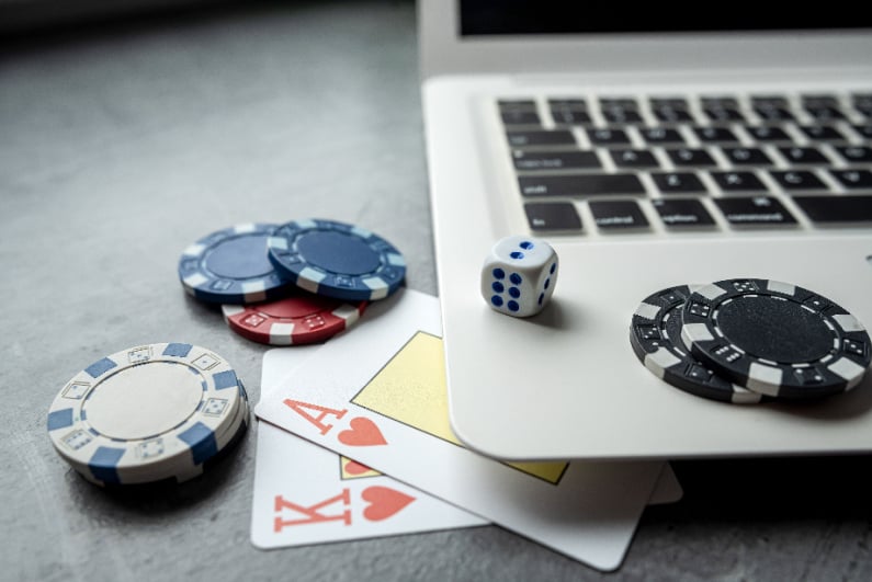 Poker chips cards and laptop